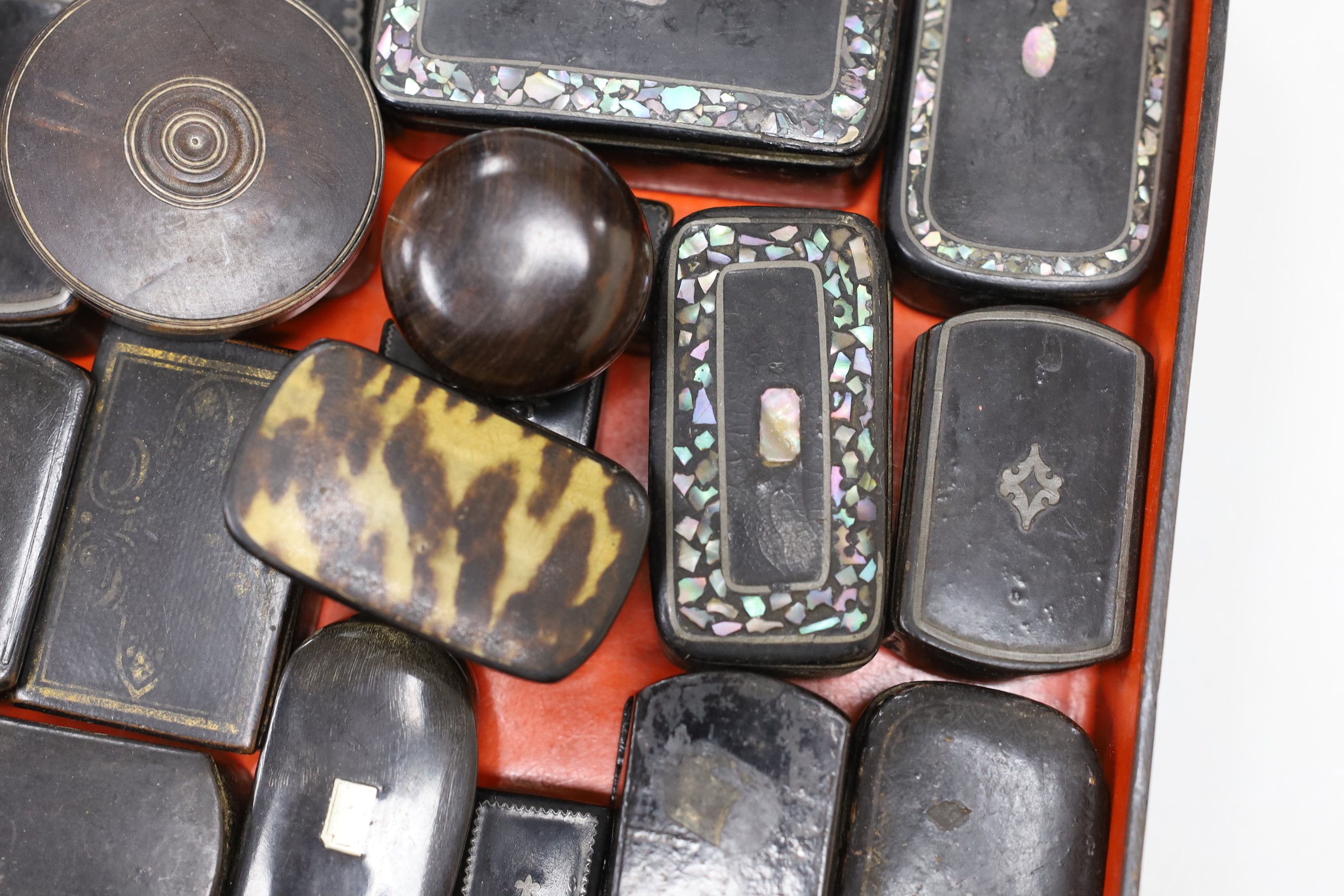 A collection of Victorian papier mache snuff boxes and a Tunbridge ware pin wheel